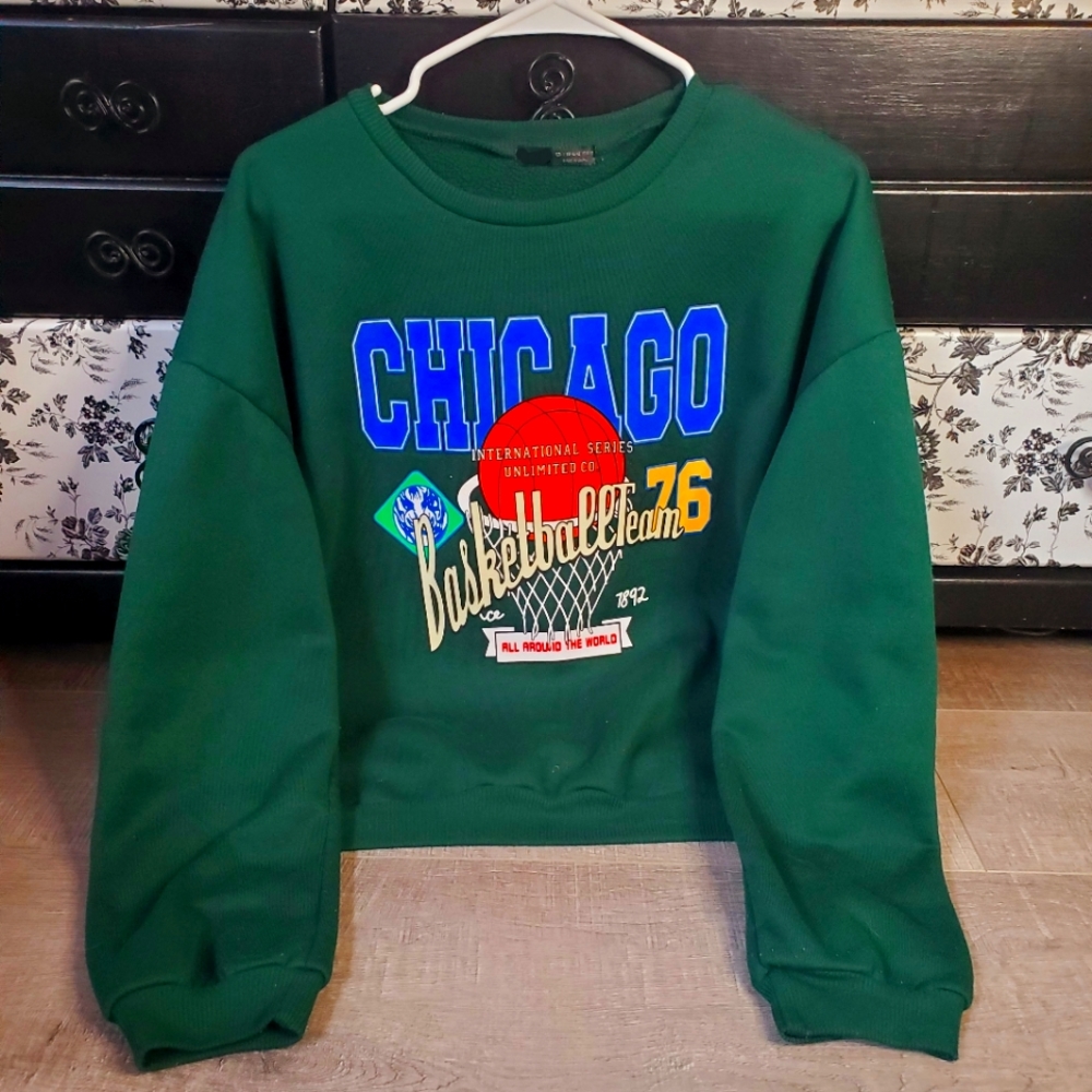 Green Chicago crew neck.